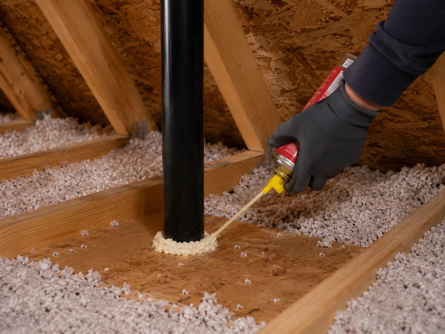 Air sealing applied around a penetration in the attic floor