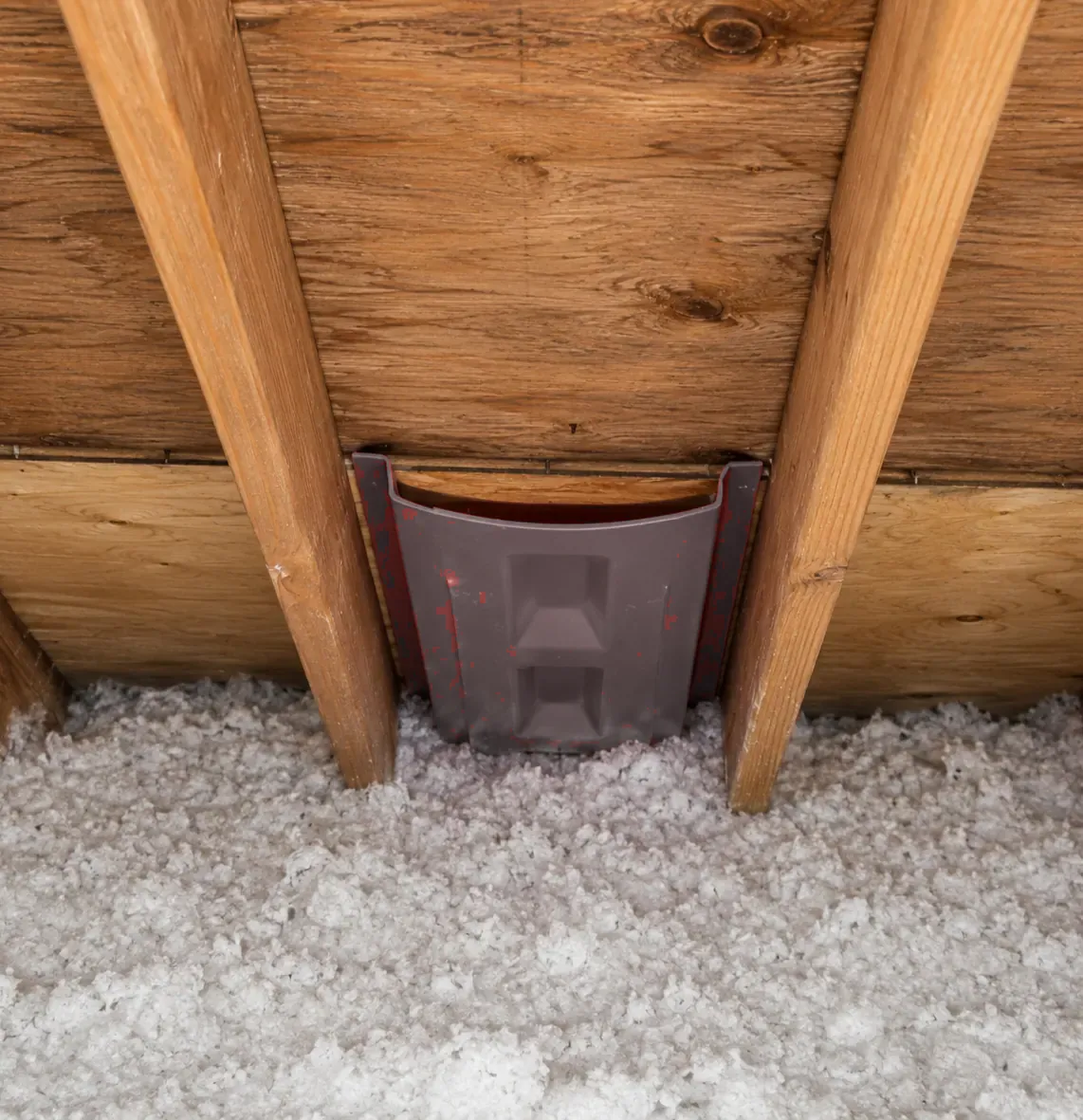 Baffle installed at the eaves to keep soffit intake clear