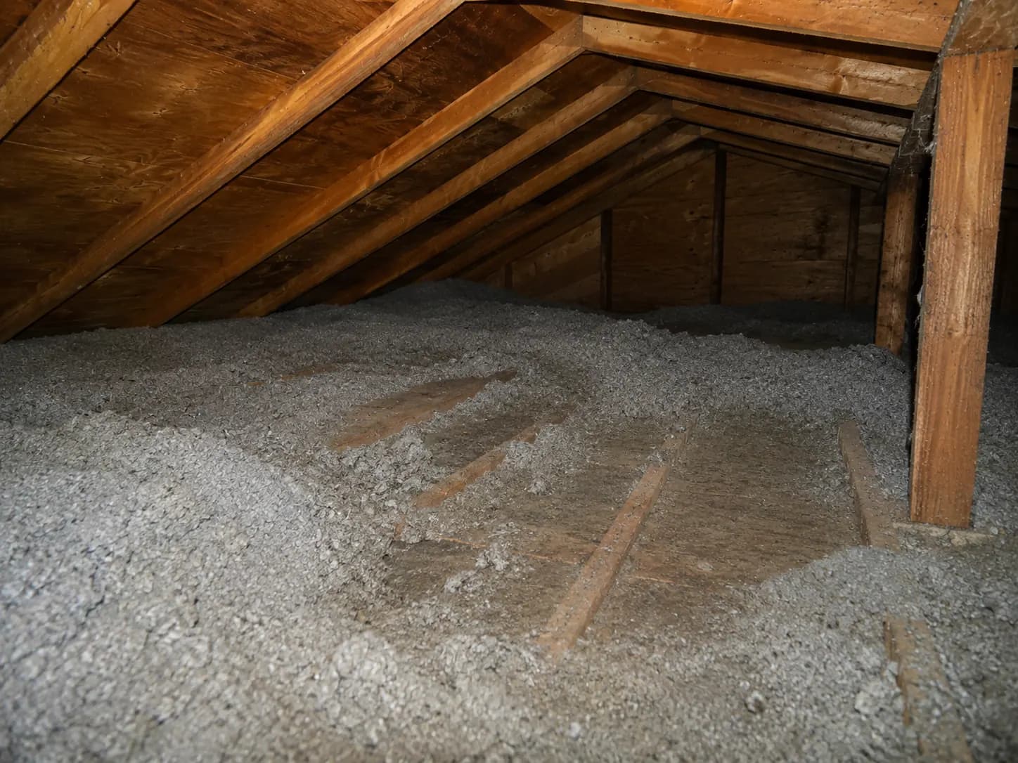 Blown insulation across an Ontario attic floor